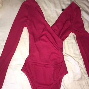 Hot pink body suit